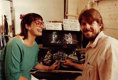 Karen Thorsen & Douglas K. Dempsey at a 16mm Steenbeck editing table, Maysles Films, New York